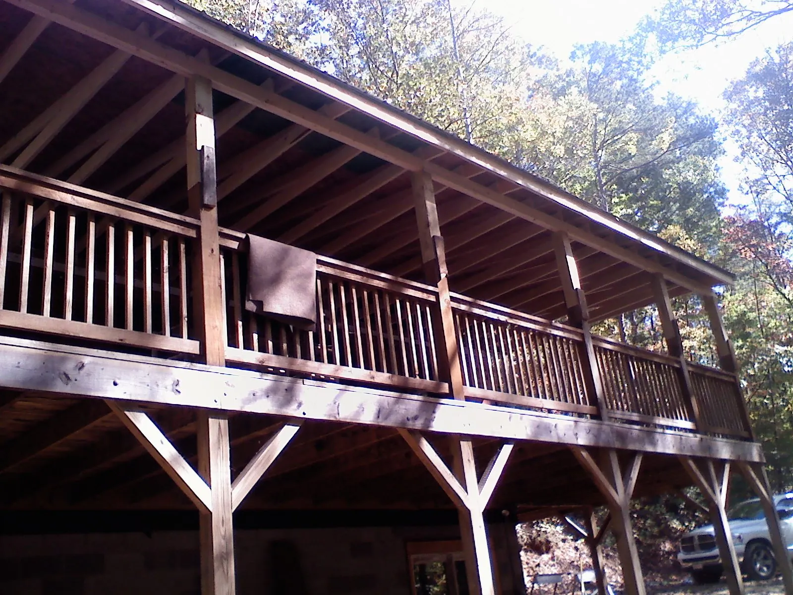 Timber framing under a new elevated porch and deck — Roof Leak Repair in Brownsburg by Roofing Brothers